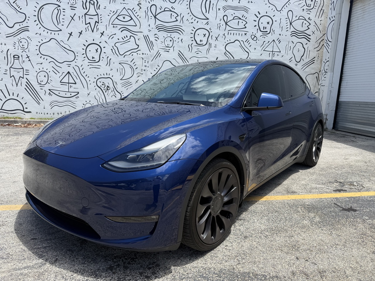 EVerify guided reference photo of a Model Y front corner